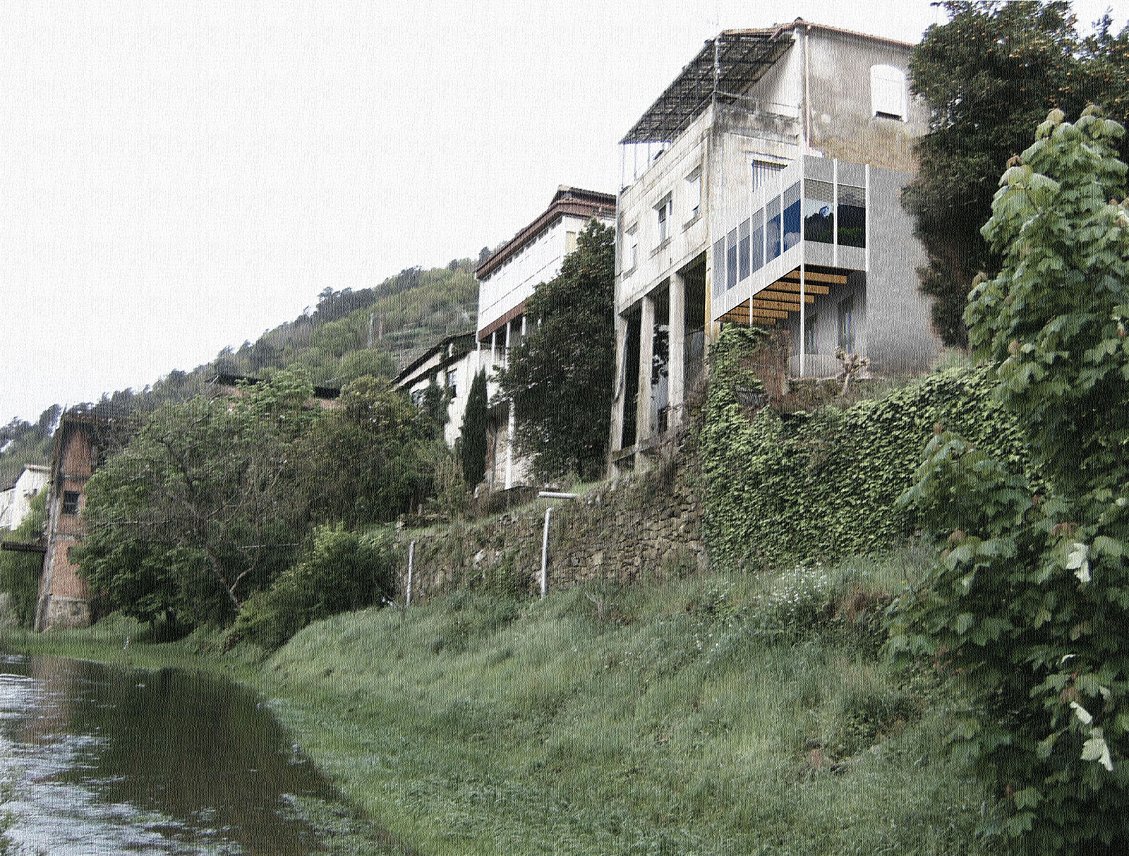 fachada de varias casas cerca del río
